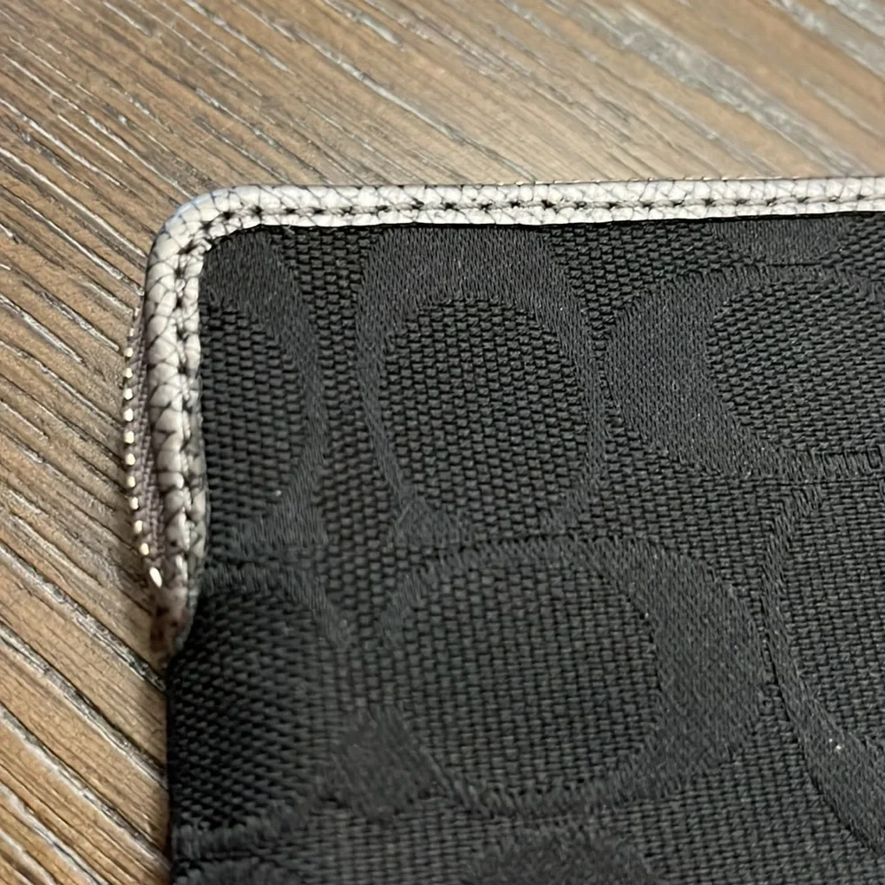 Coach black signature silver metallic leather edge wristlet